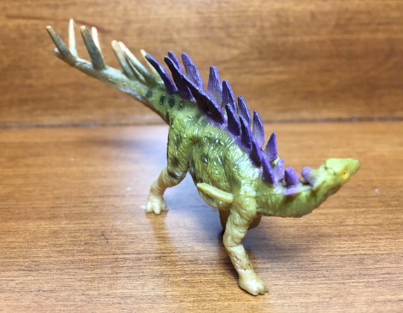 dinosaur with spikes on head and back