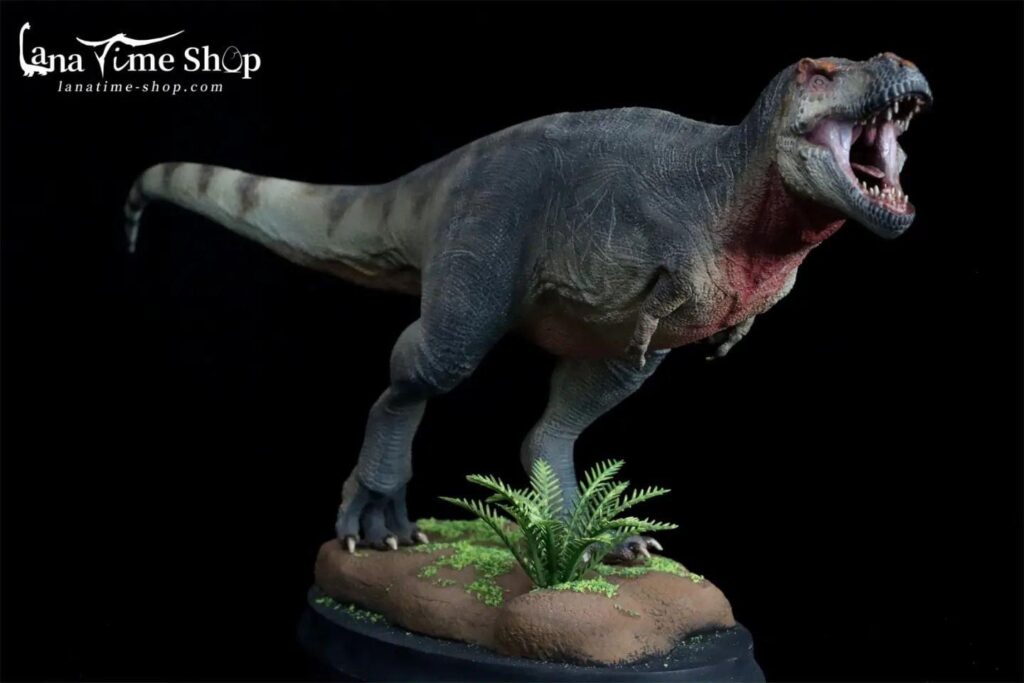 A T. rex statue on a base
