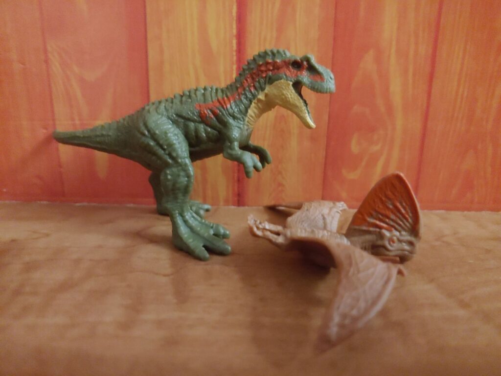 Albertosaurus and Tupandactylus, right side.