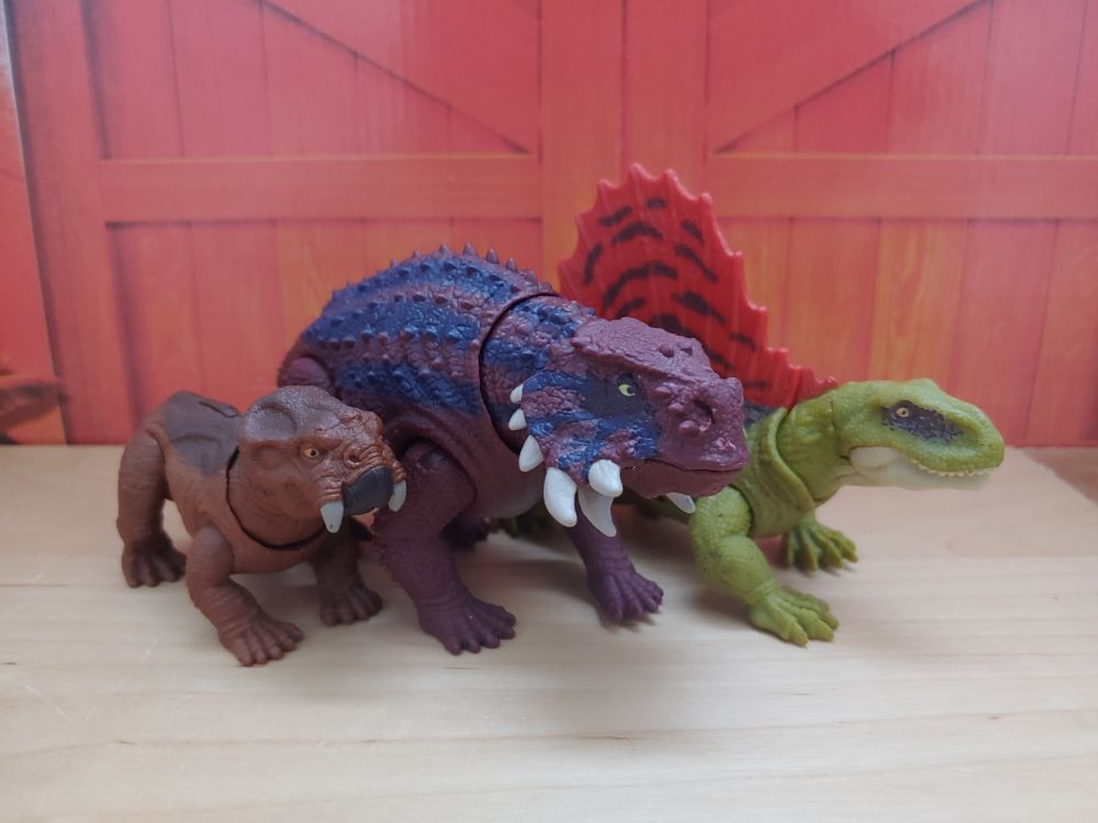Scutosaurus with the 2022 Dominion Lystrosaurus and Extreme Damage Dimetrodon. Scutosaurus is in the middle, Lystrosuarus on the left, and Dimetrodon on the right