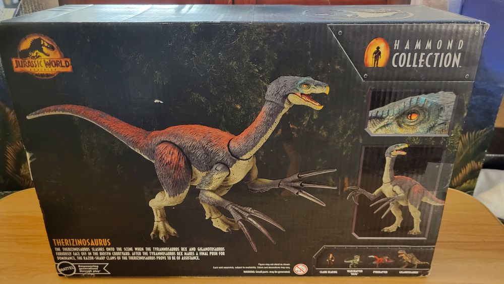 Therizinosaurus box back, has various renders of the figure in different poses